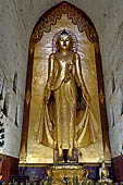 Ananda temple Bagan, Myanmar. The 9-meter-high images of standing Buddha. 